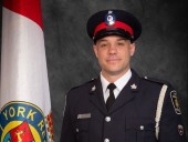Was young driver impaired when he crashed into cop going to work?