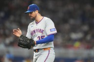 Alonso and Holmes lead Mets past Marlins 5-0 to push NL wild-card race to final day of season