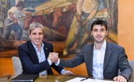 Torres firmó convenios con Luis Caputo para extinguir deudas y transferir obras y viviendas