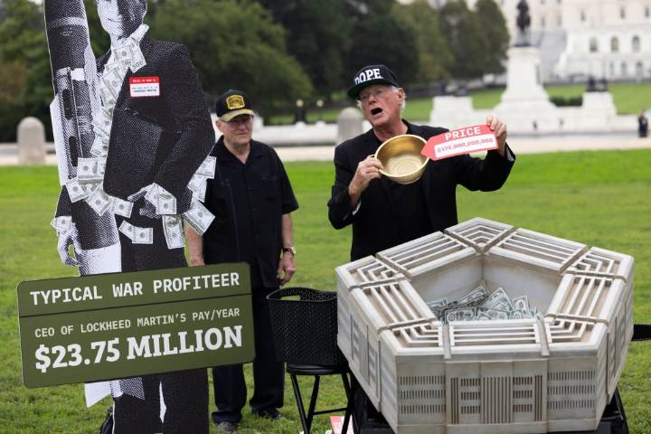 Ben of Ben & Jerry’s chainsaws mini Pentagon on Capitol Hill 