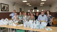El Orfeón Condal de Noreña celebró el Día de la Santina con el tradicional reparto del bollo a sus socios