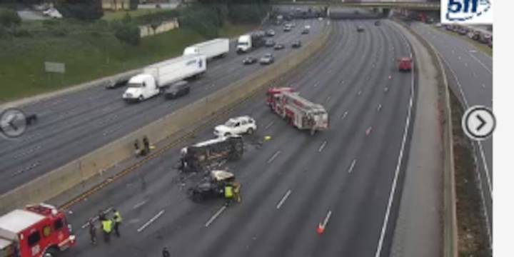Overturned car blocking left lanes on I-285 eastbound near Buford Highway