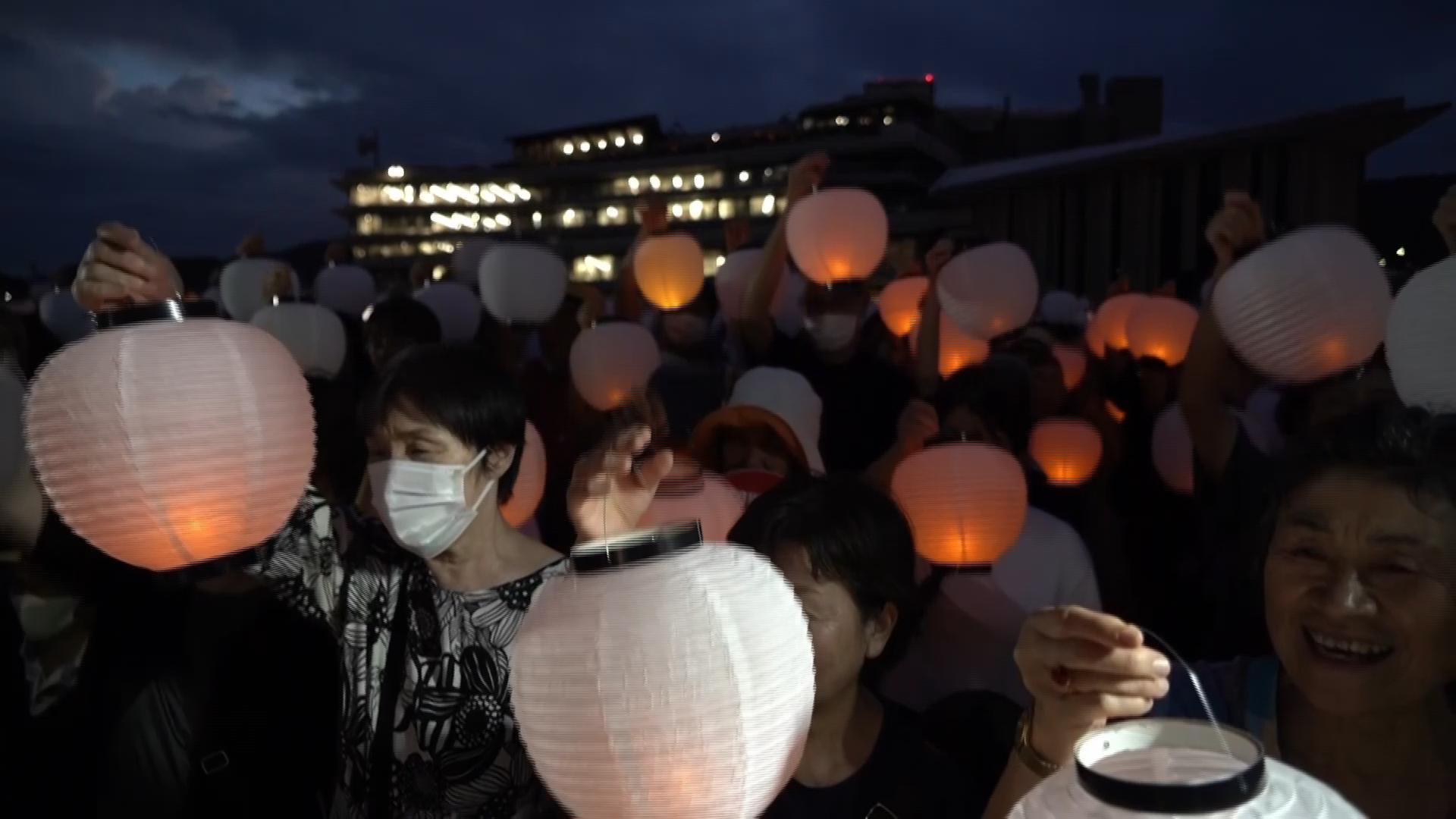 Fireworks and lanterns welcome Japanese emperor and his family as they visit Nagasaki