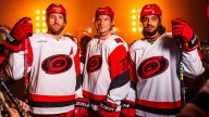 Carolina Hurricanes showcase their latest road uniforms in new video trailer
