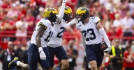 No. 21 Michigan uses 3 long TD runs to beat Nebraska 30-27, extend Huskers' skid against Top 25 foes