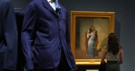 Giorgio Armani's sartorial creations interplay with Italian masterpieces at Milan museum exhibition