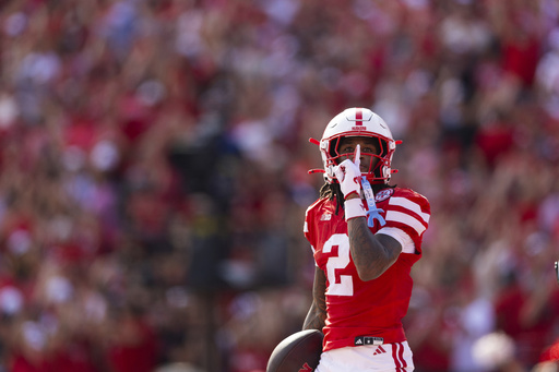 Nebraska completes Hail Mary TD to tie No. 21 Michigan as half expires