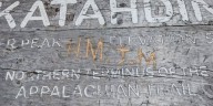 Baxter Peak summit sign on top of Katahdin vandalized