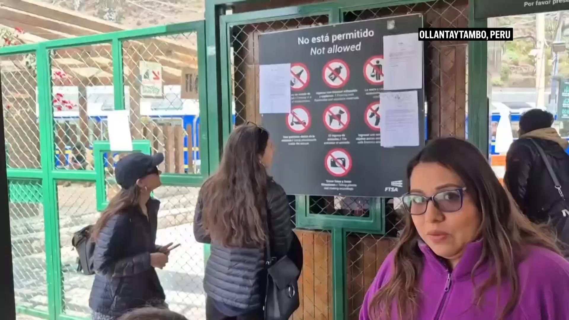 Hundreds wait for a train to Machu Picchu after protesters lift blockade during negotiations