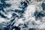 Lorena becomes a hurricane off the western coast of Mexico as Kiko travels over open waters
