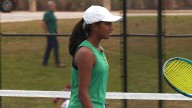 Devi Rao rushes the net for a stellar swing and a big point