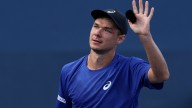 CEO issues apology after being seen on camera taking hat from child at US Open