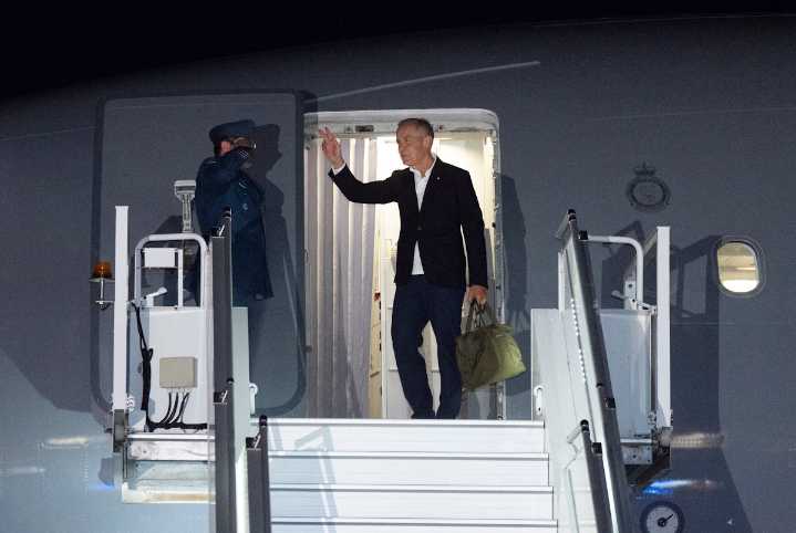Carney's globe-spanning travel schedule draws both criticism and praise