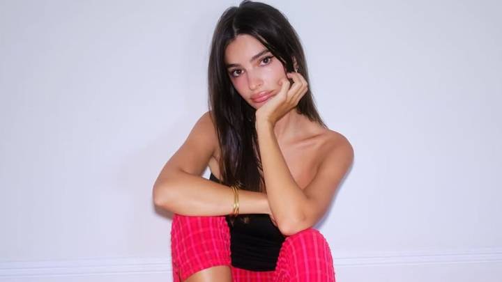 Emily Ratajkowski clings onto summer in tube top and capri pants