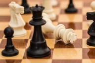 Anal insertion champion accused of playing chess during live squeezathon