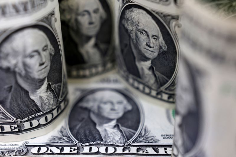 Dollar slips as traders await Fed interest rate decision