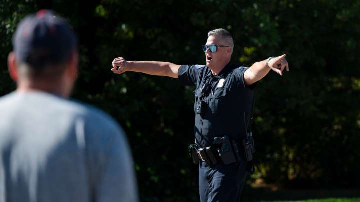 Man arrested after driving through barriers near Grand Blanc church shooting