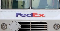 Dallas FedEx worker charged after hammer and gun attack on co