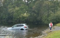 WATCH: ICE Protester’s Car Rolls Into Lake While She Yelled at Agents