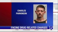 Man charged in crash that knocked down...