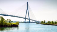 Detroit’s Gordie Howe bridge is poised to open as truck traffic between US-Canada slows – low-income residents are deciding whether to stay or go