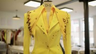 After hundreds of hours of work, couture designer Robert Wun takes a lighter to his pieces