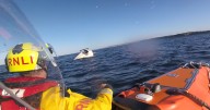 East Lothian RNLI crews called after sailing dinghy capsizes with two on board