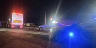 Crash between garbage truck, motorcycle sends one to hospital