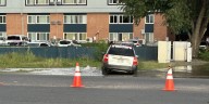 Stretch of North Academy closed after crash impacts fire hydrant