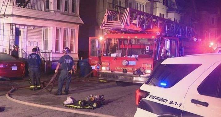 New Bedford firefighters battle raging blaze, rescue people, cat but 14 residents left homeless, displaced