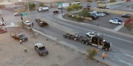 Driver hurt after SUV crashes into bridge pillar on truck in south Phoenix