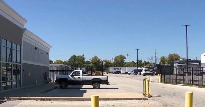 Six children including 2-month-old discovered 'locked inside storage unit'