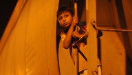 Migrant Child Dreams Of Someday Crossing Border To Enjoy Dr. Seuss Books, Pepe Le Pew Cartoons, Aunt Jemima Pancakes