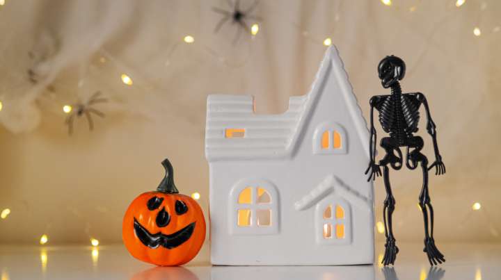 Turn Thrifted Holiday Villages Into A Spooky