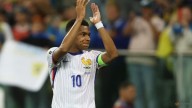 Mbappe says tying Henry an honour but not dwelling on all