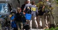 Judge releases redacted document used to justify search of John Bolton's home