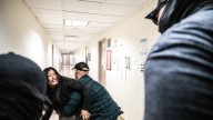 ICE officer caught on video pushing woman is placed on leave