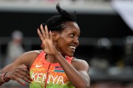 Kipyegon wins in a breeze for fourth world title at 1,500 meters