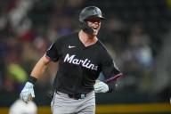 Johnston and Norby hit back-to-back homers in sixth to push Marlins past slumping Rangers, 4