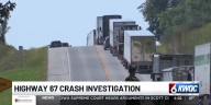Woman dies in head-on crash on US 67