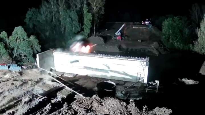 Shocking moment speeding car flies off unfinished bridge and EXPLODES in mid