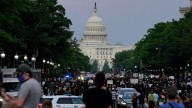 FBI fires agents photographed kneeling during 2020 racial justice protest, AP sources say