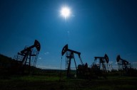 Oil inches up as tension flares in Europe, Middle East