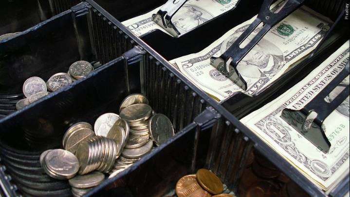 Federal Reserve cuts key rate by quarter-point and signals two more cuts this year
