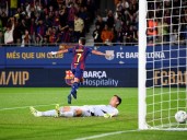 Torres double helps Barca down listless Getafe