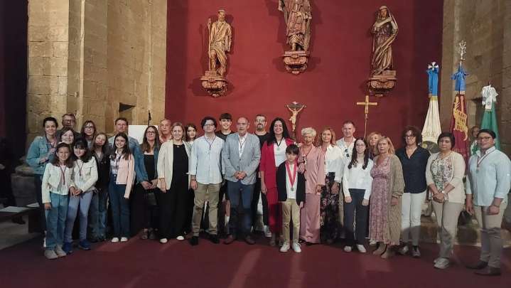 La emoción ilumina la oscuridad en el Día del Cofrade de la Real de San Lorenzo en Loreto