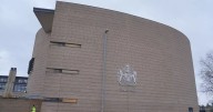 Man found hiding in bin by police after attacking friend and speeding away