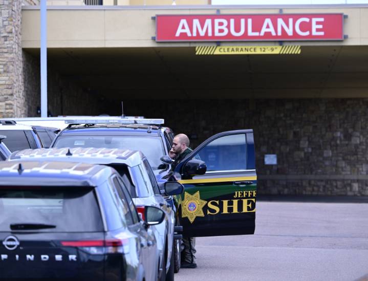 Authorities say student who had been radicalized fired revolver at Colorado school, wounding 2