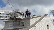 WATCH: Canton firefighters rescue 'Lucky' dog from 'woof' of Gobel Avenue home