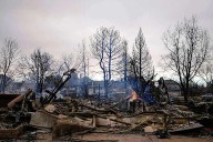 Xcel Energy will pay $640M to settle claims from Denver-area wildfire that burned 1,000 structures